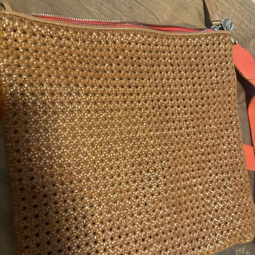 Clare V leather foldable worn with or without straps.